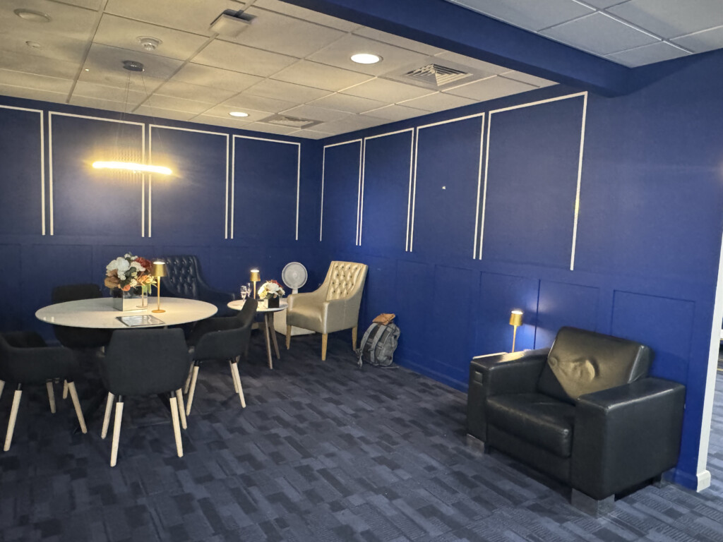 a room with a table and chairs