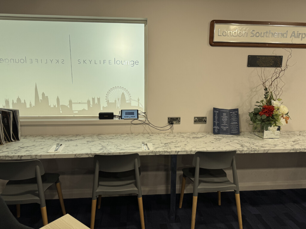 a table with chairs and a window