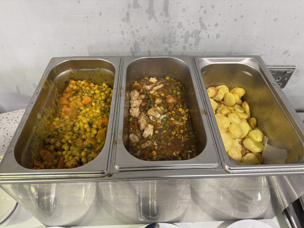 a trays of food in a row
