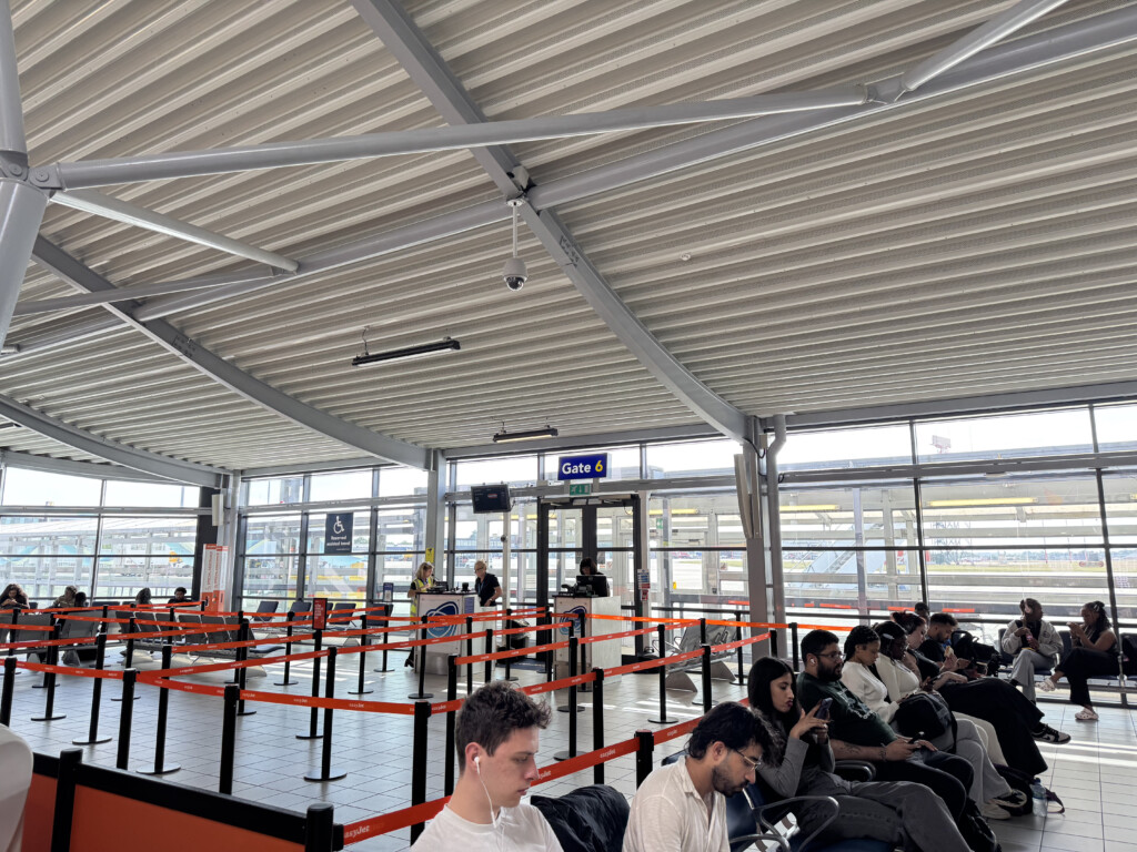a group of people sitting in a terminal