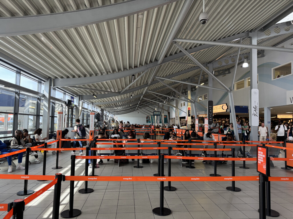 a group of people sitting in a terminal