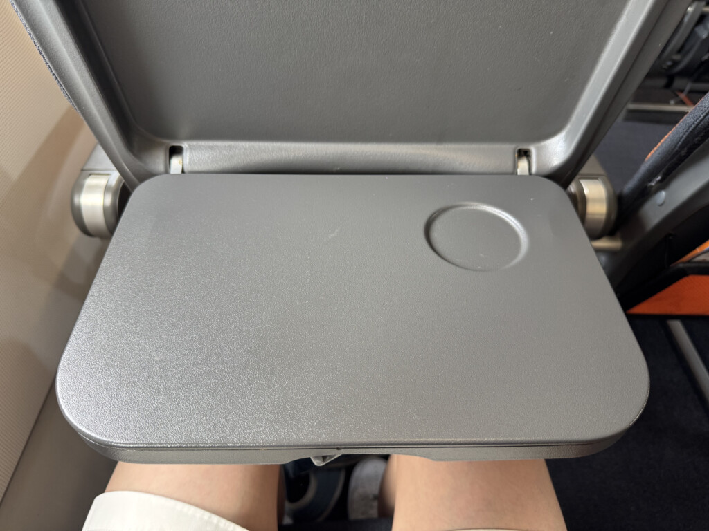 a silver object with a circle in it