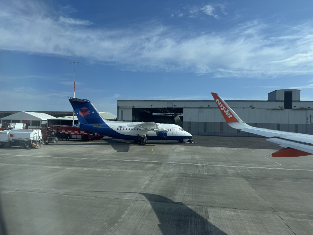 a plane parked in a hangar