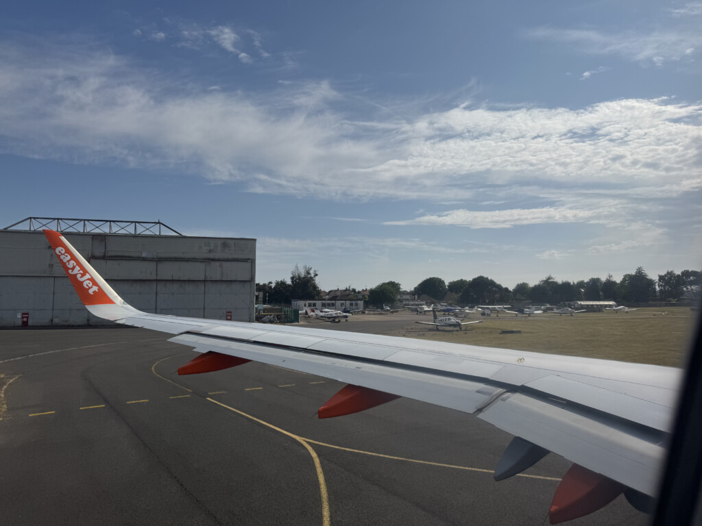 an airplane wing on a runway