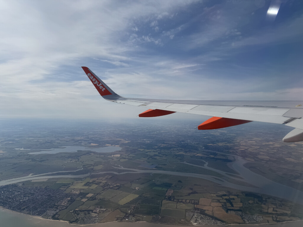 an airplane wing in the sky