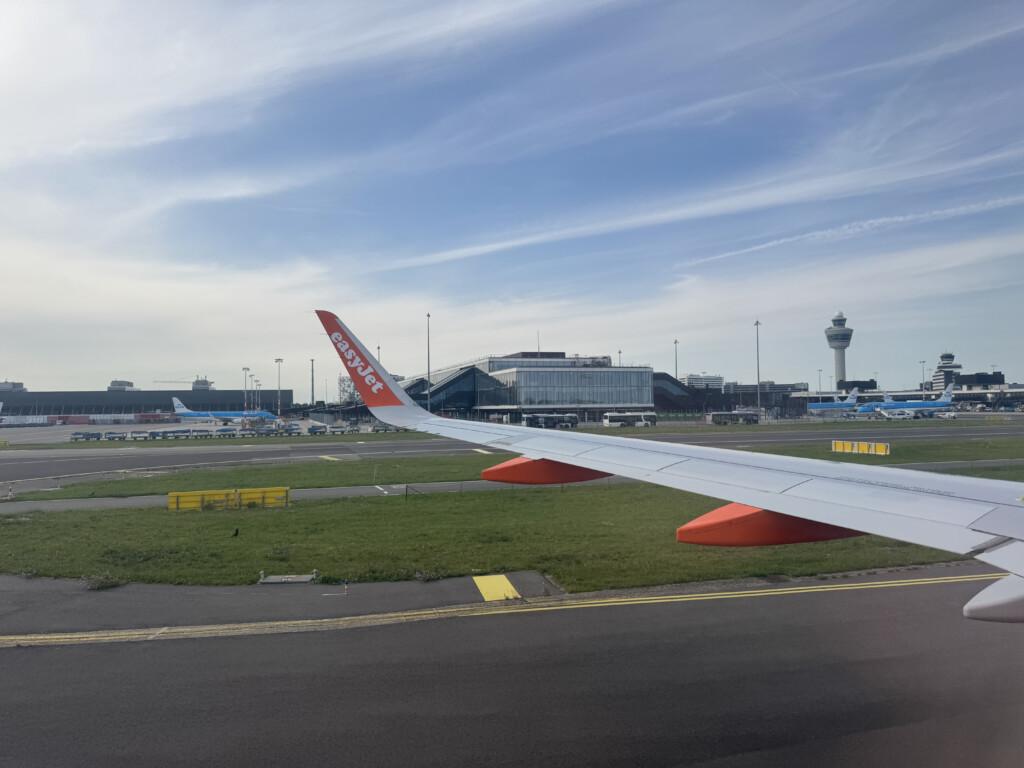 an airplane wing on a runway