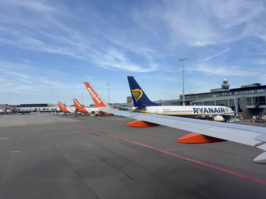 airplanes parked on a runway