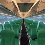 an airplane with green seats
