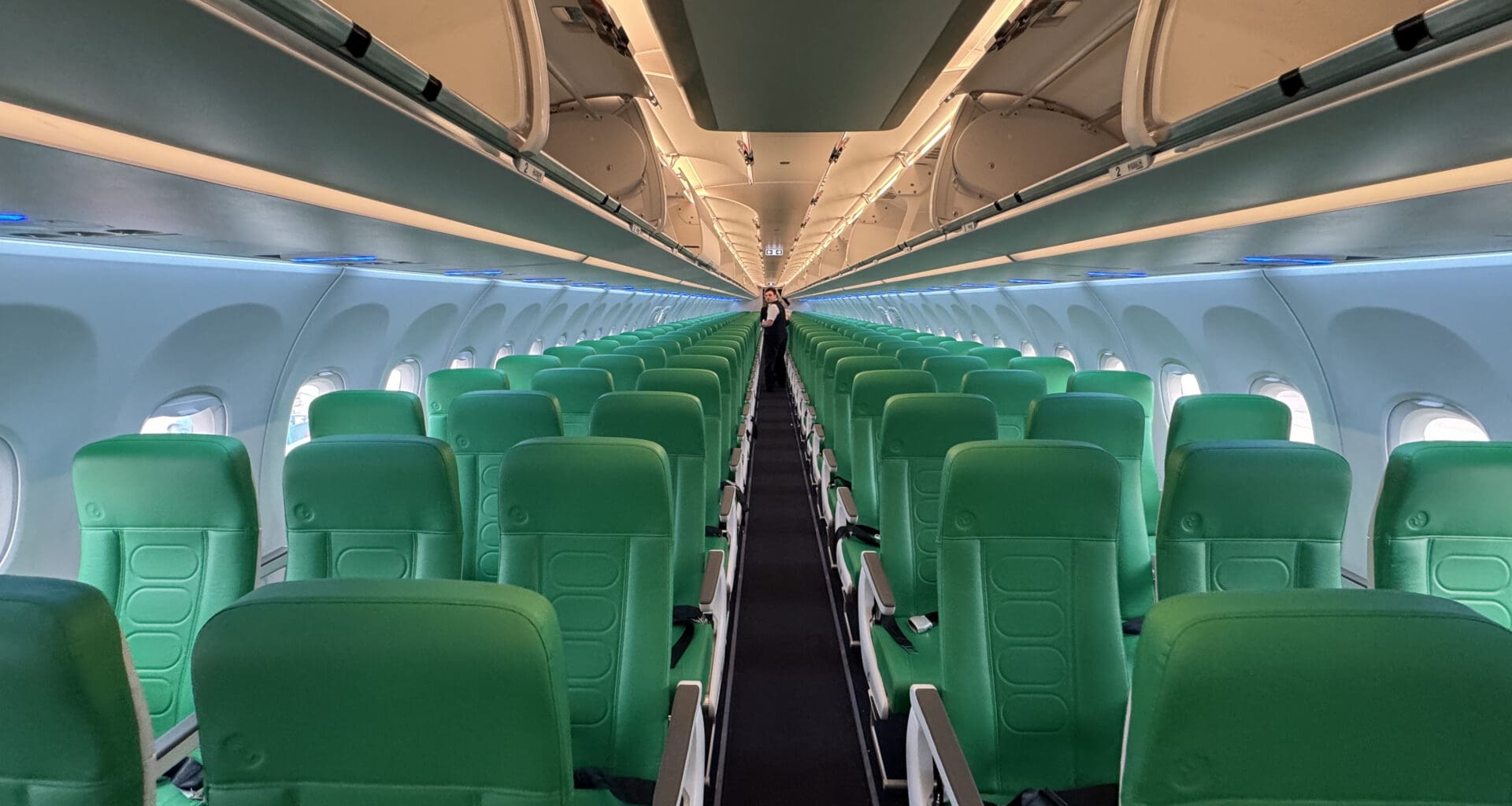 an airplane with green seats