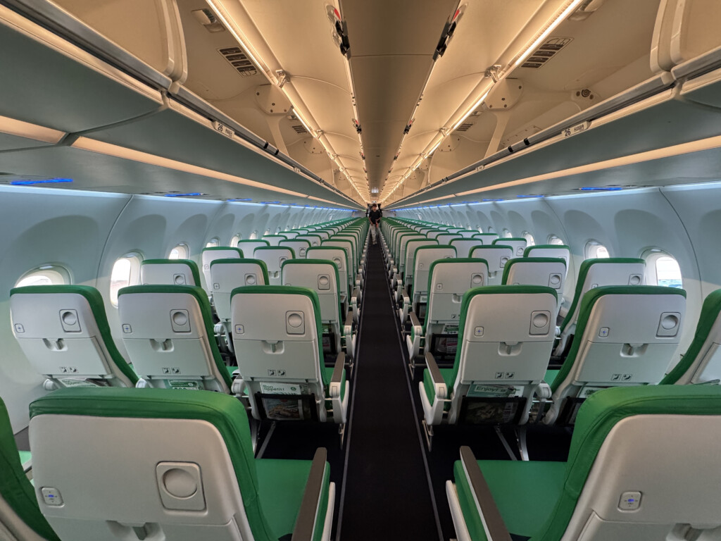 an airplane with green seats