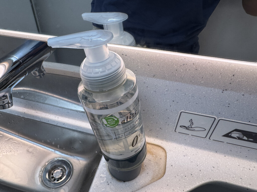 a soap dispenser on a sink