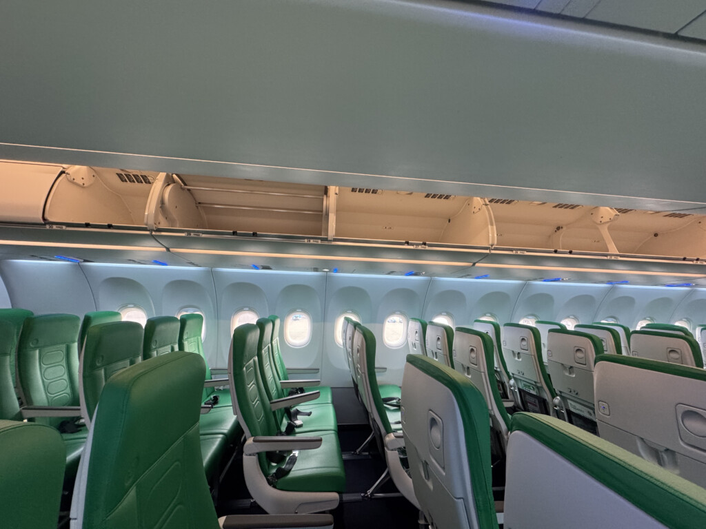 an airplane with green seats