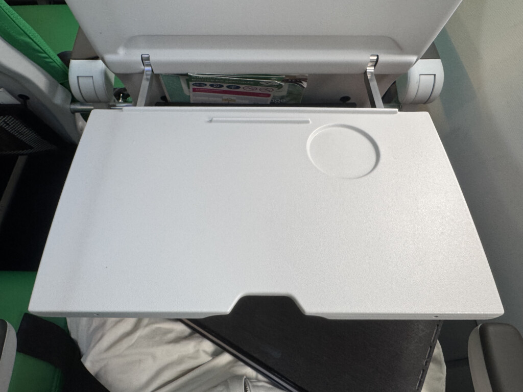 a white plastic tray with a circle on the top