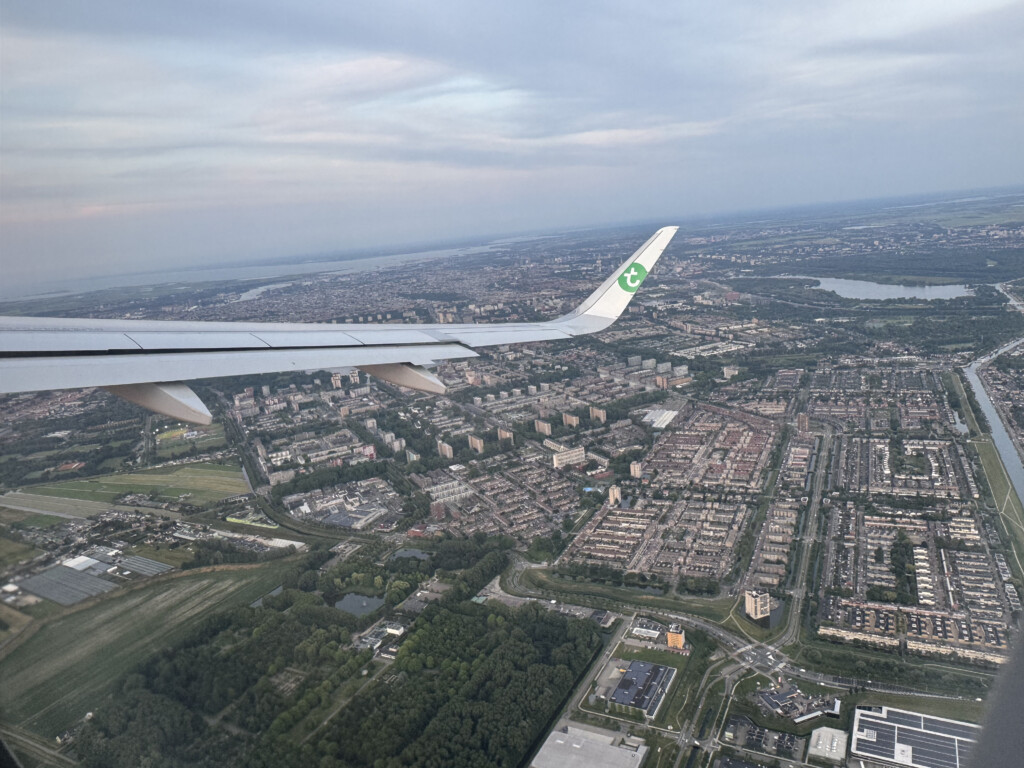 an airplane wing in the sky