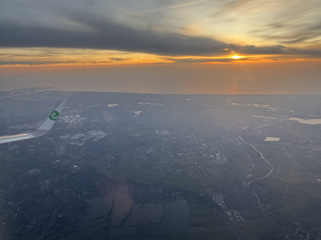 an airplane wing in the sky