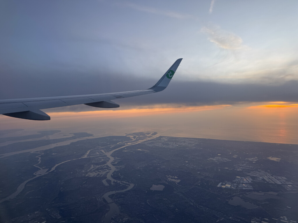 an airplane wing in the sky