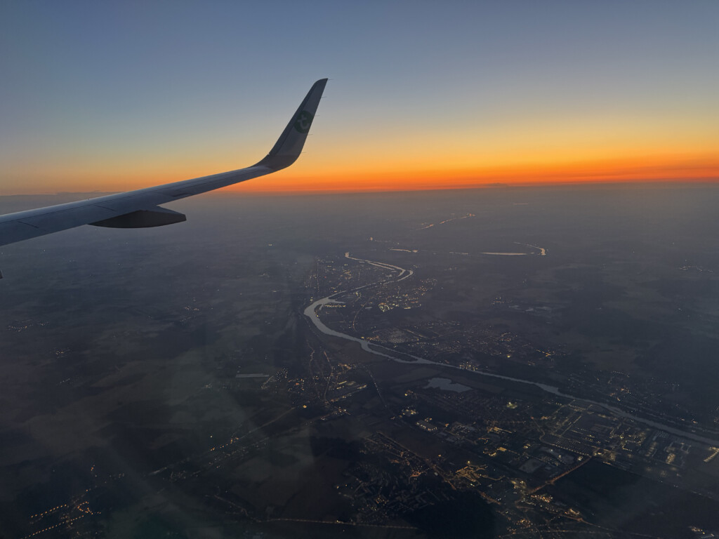 an airplane wing in the sky