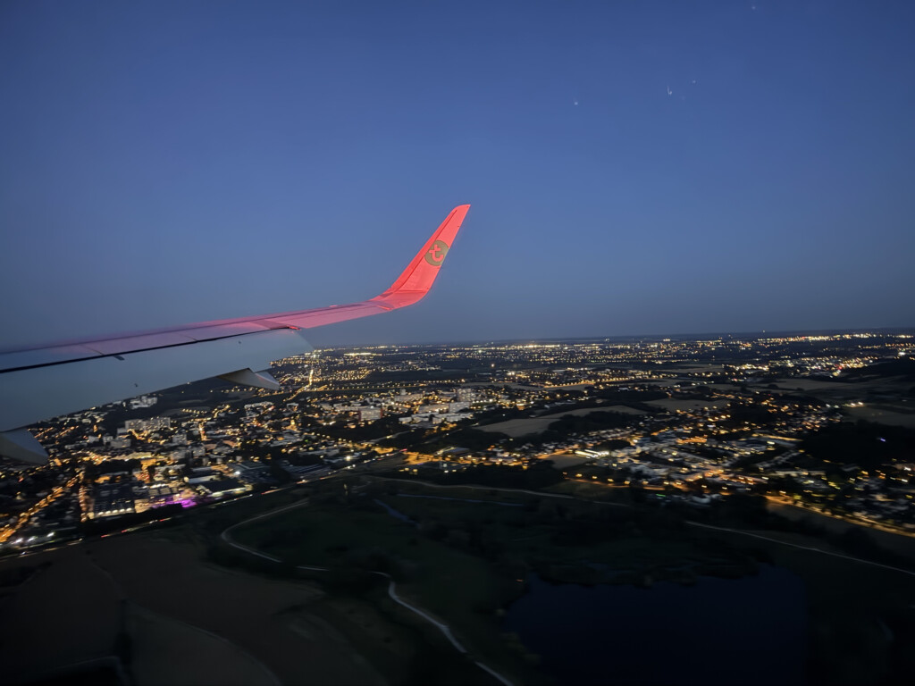an airplane wing in the sky