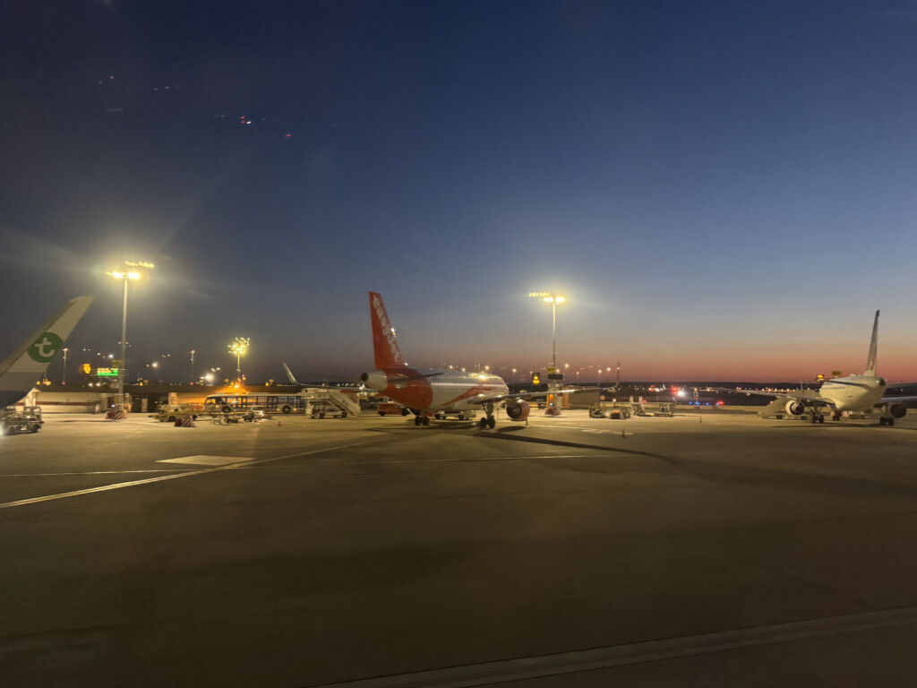 an airplane on a runway at night