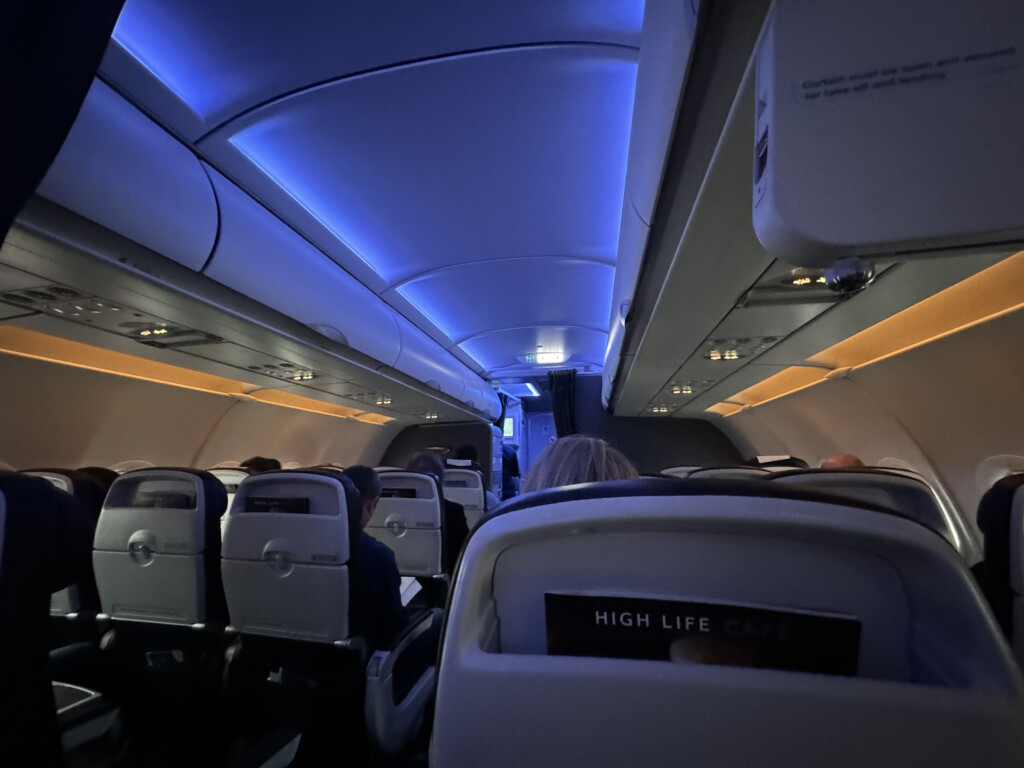 an airplane with seats and lights