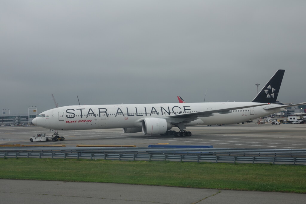 a large white airplane on a runway