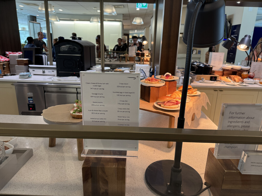 a restaurant with food on the counter