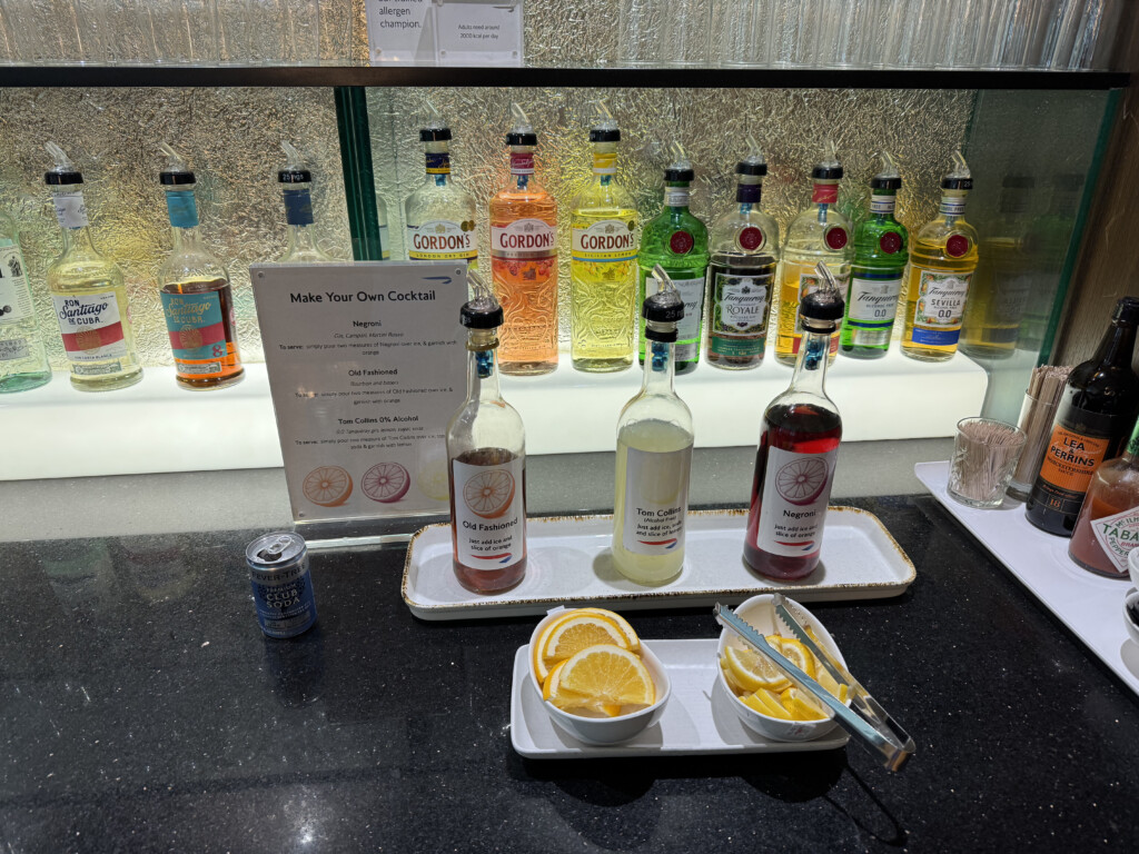 a row of bottles of alcohol on a counter