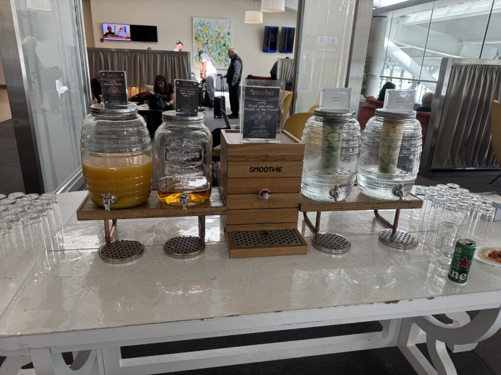 a group of glass jars with liquid in them on a table
