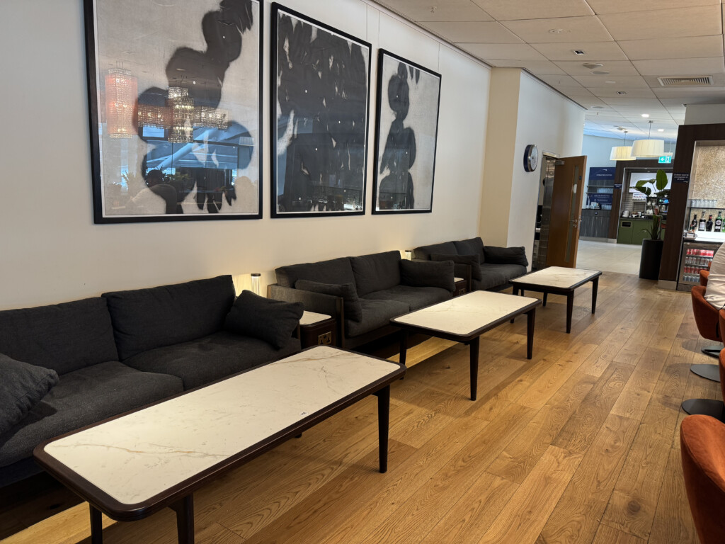 a room with couches and tables