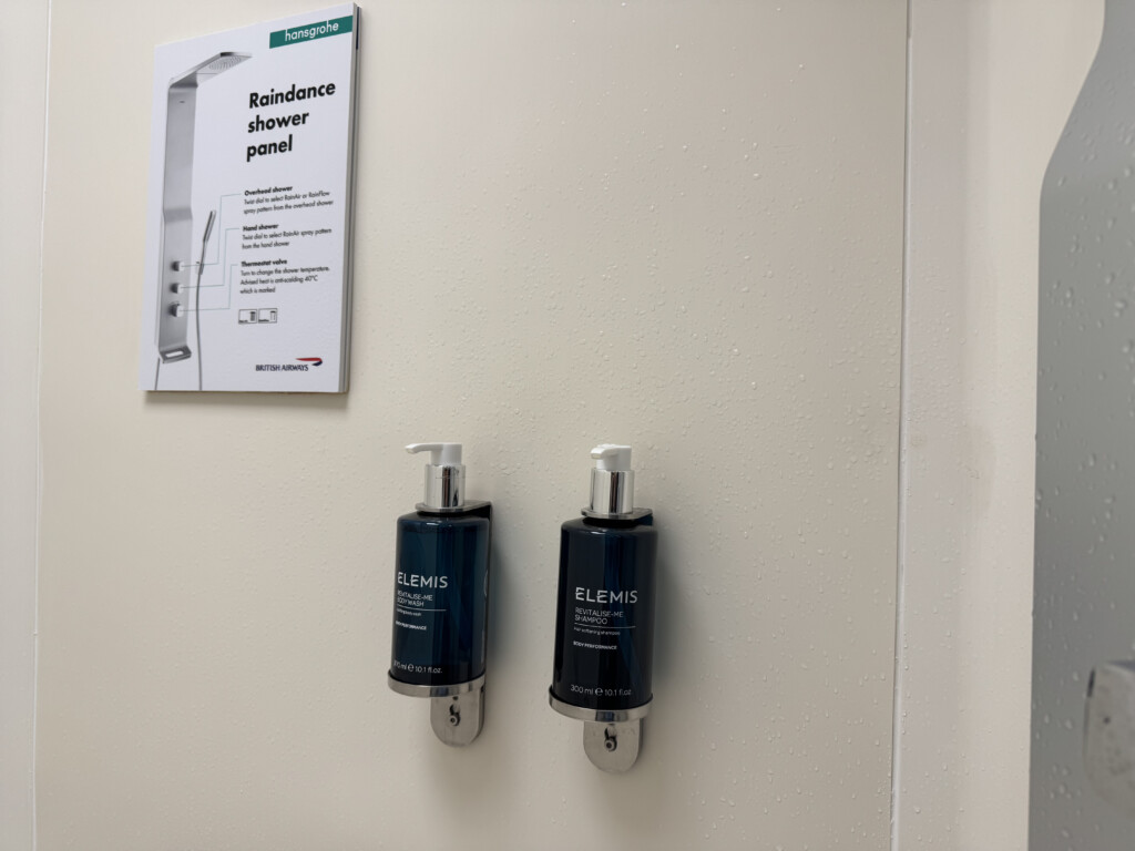 a couple of blue containers on a white wall