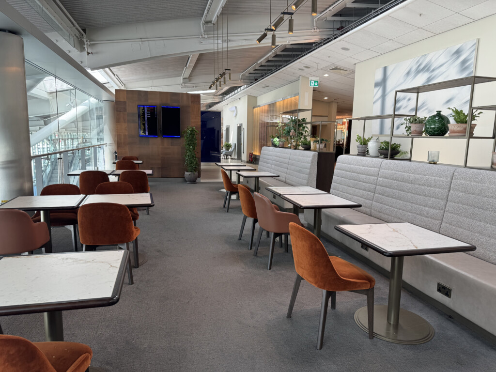 a room with tables and chairs