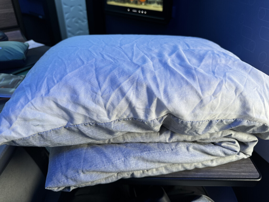 a stack of pillows on a table