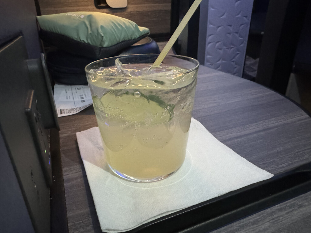 a glass with a straw in it