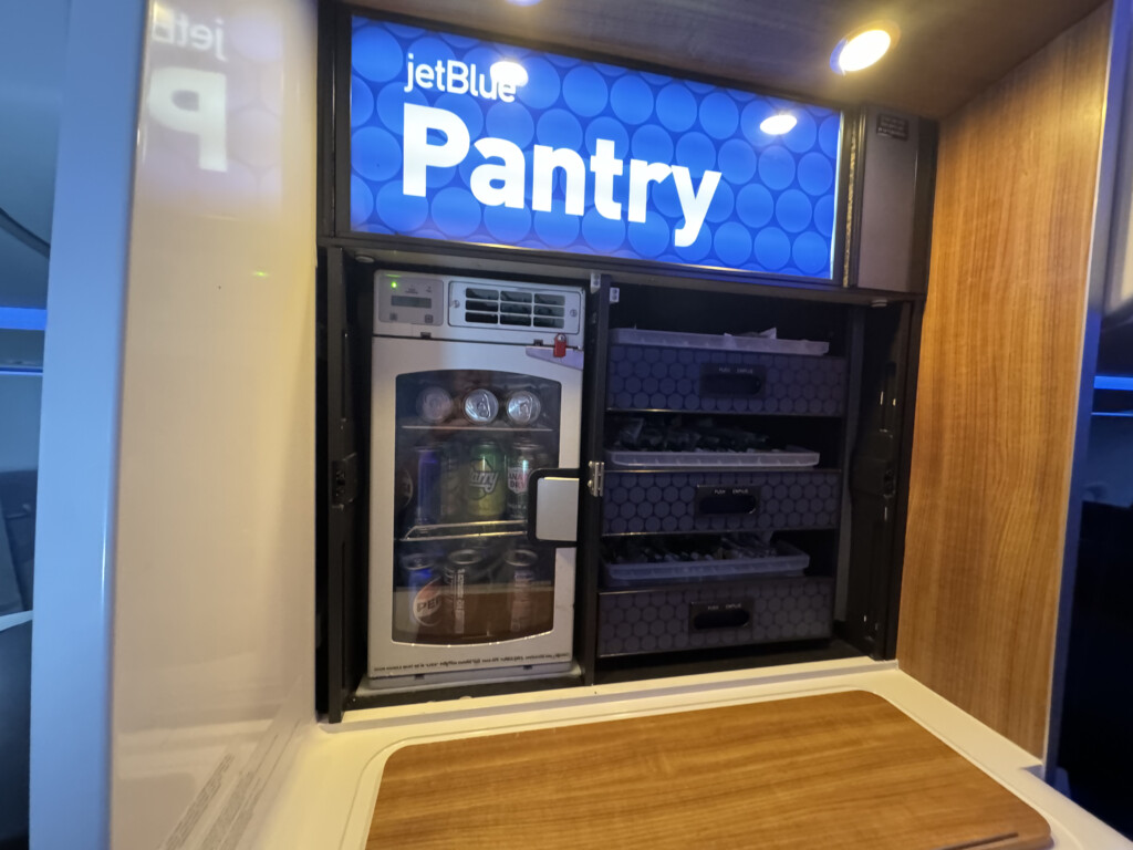 a refrigerator with drinks inside