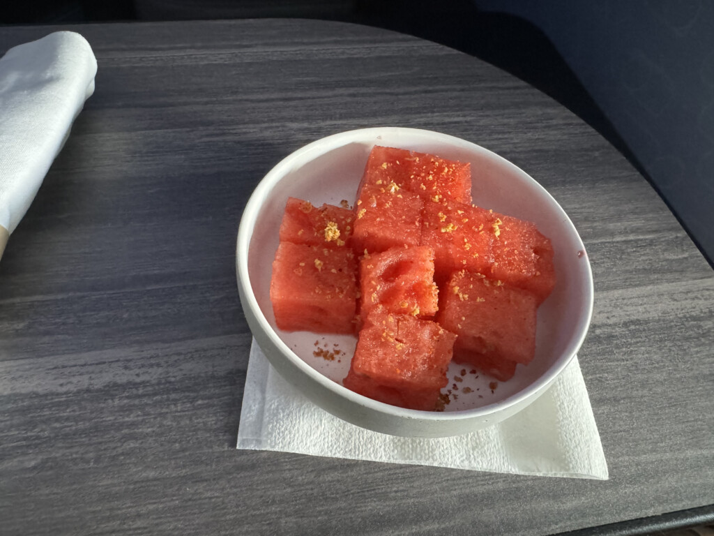 a bowl of watermelon on a table