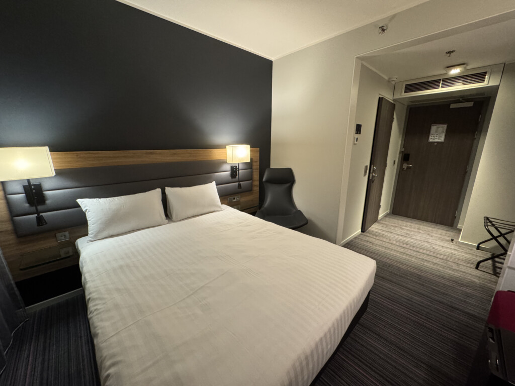 a bed in a hotel room