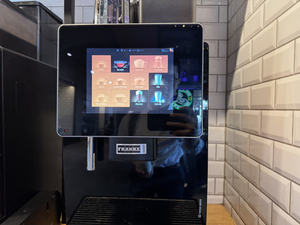 a black machine with a screen