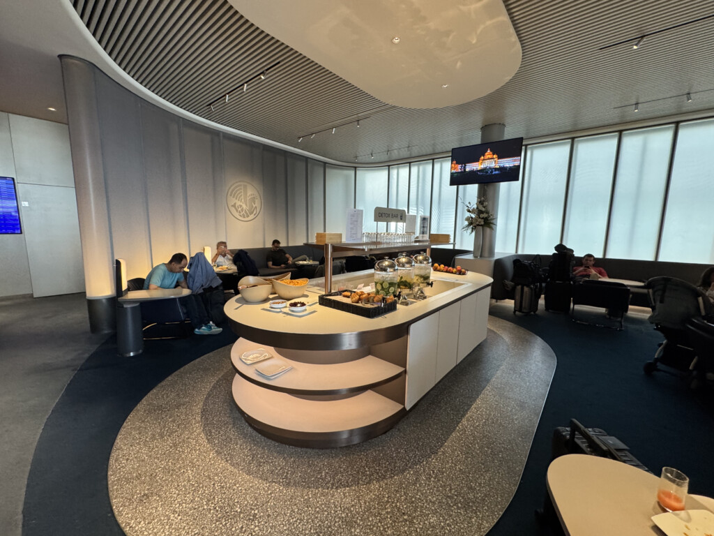 a room with a large table with food on it