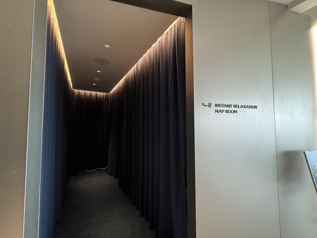 a room with a curtain and a door