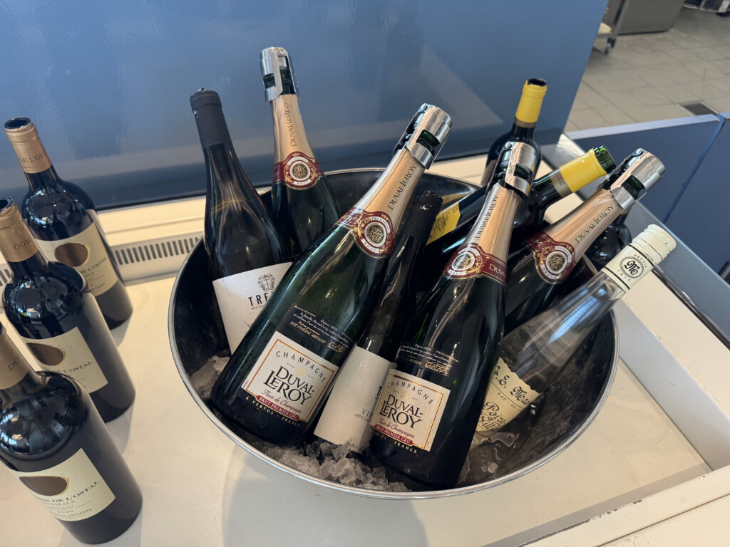 a bucket of wine bottles