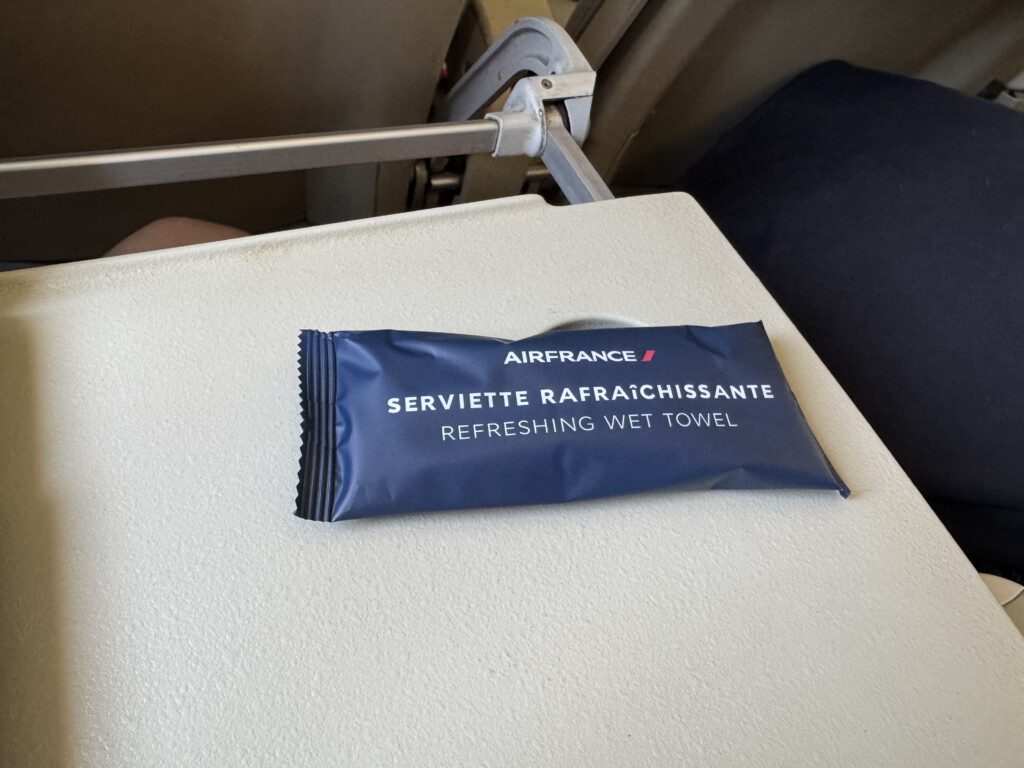 a blue package on a white surface