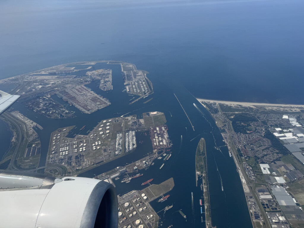 an aerial view of a city and water