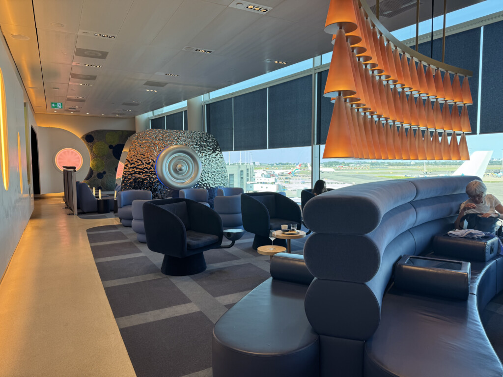 a room with a large round object and a large ceiling