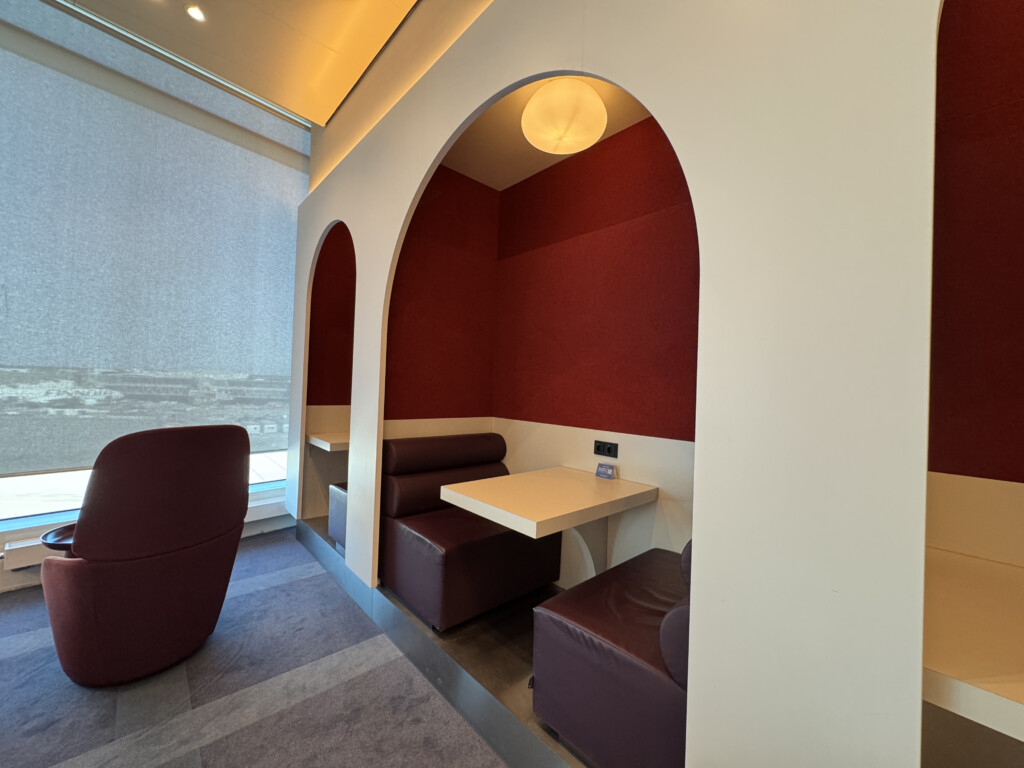 a room with a table and chairs