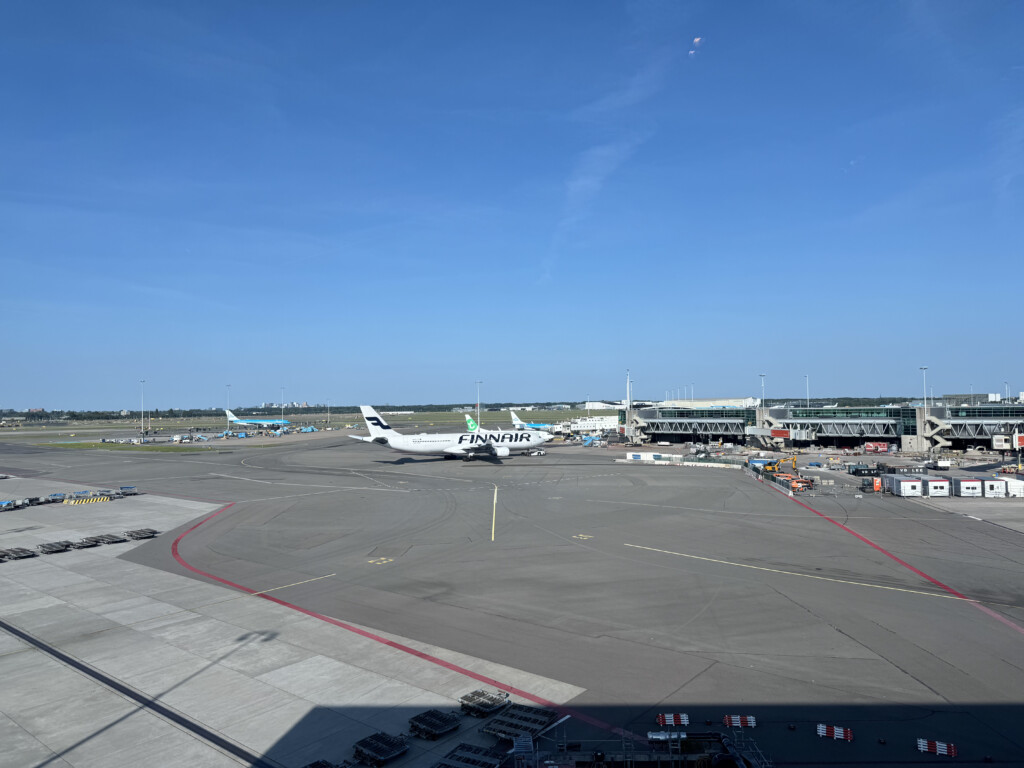 an airport with airplanes on the ground