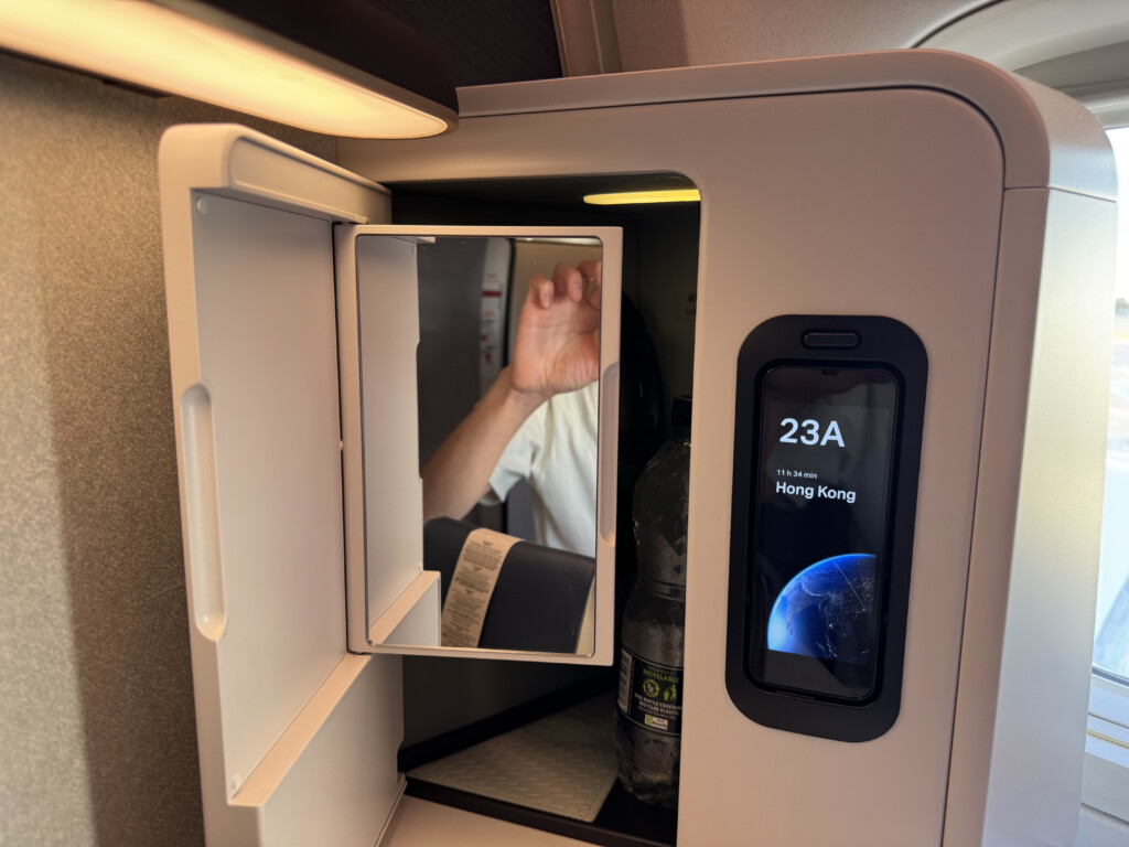a person taking a selfie in an airplane