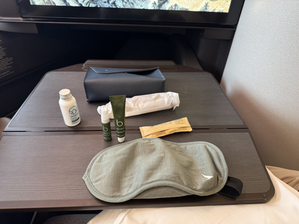 a sleeping mask and other items on a table