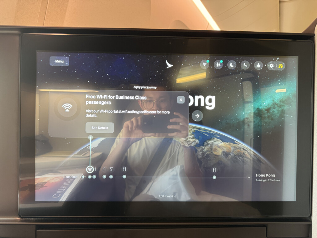 a screen with a person taking a selfie