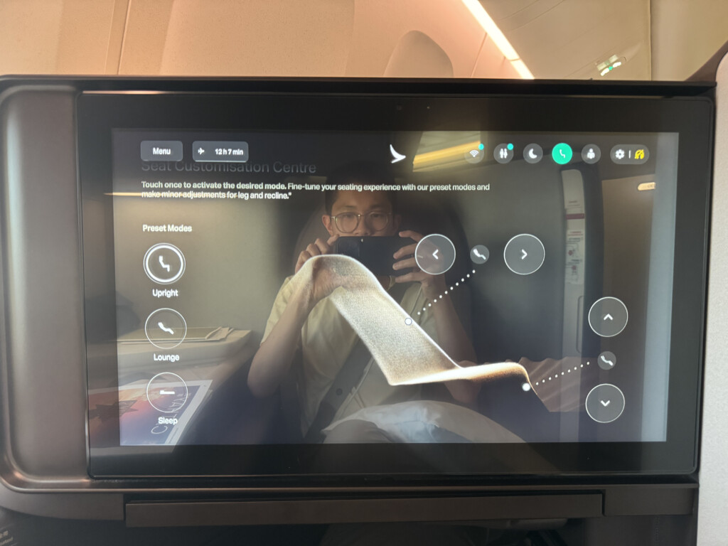 a screen with a person taking a picture of a person
