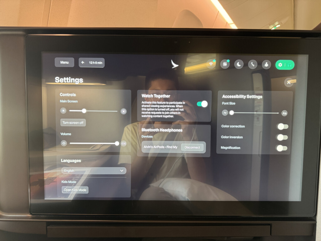a screen with a person taking a selfie